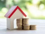 Playhouse with coins in front