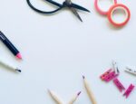 A white background with arts and crafts supplies.