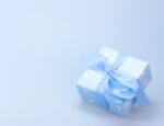 A light blue polka dot present.